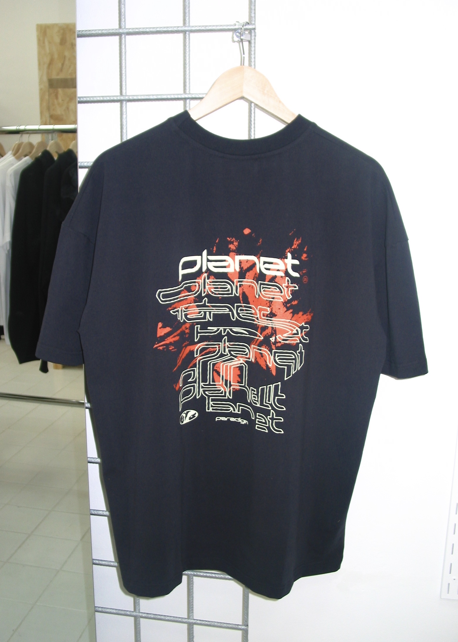 Planet Paradigm Merch Tee Orange