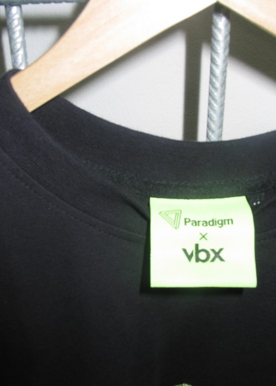 Planet Paradigm Merch Tee Label